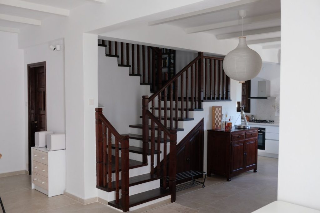 Staircase. Enjoy a fresh renovated beautiful holiday apartment overlooking the fabulous nature of Pilion and the quaint village Lafkos.