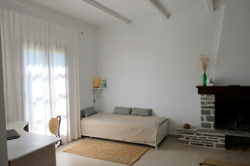 Guest bed. Lovely holiday apartment in Lafkos, a quaint mountain village in Pelion, Greece.
