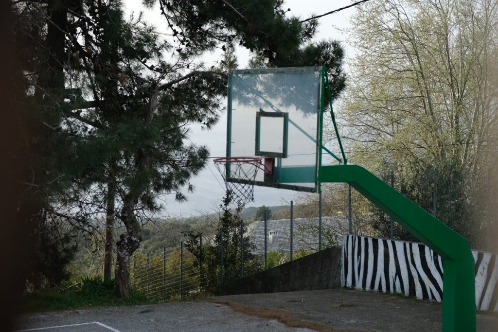 Basketball court. The Village Lafkos is one of the most beautiful and authentic places on the Greek peninsula of Pelion, characterized by an atmospheric square and the absence of cars. Vacation home in Pelion. Holidays in Greece. 