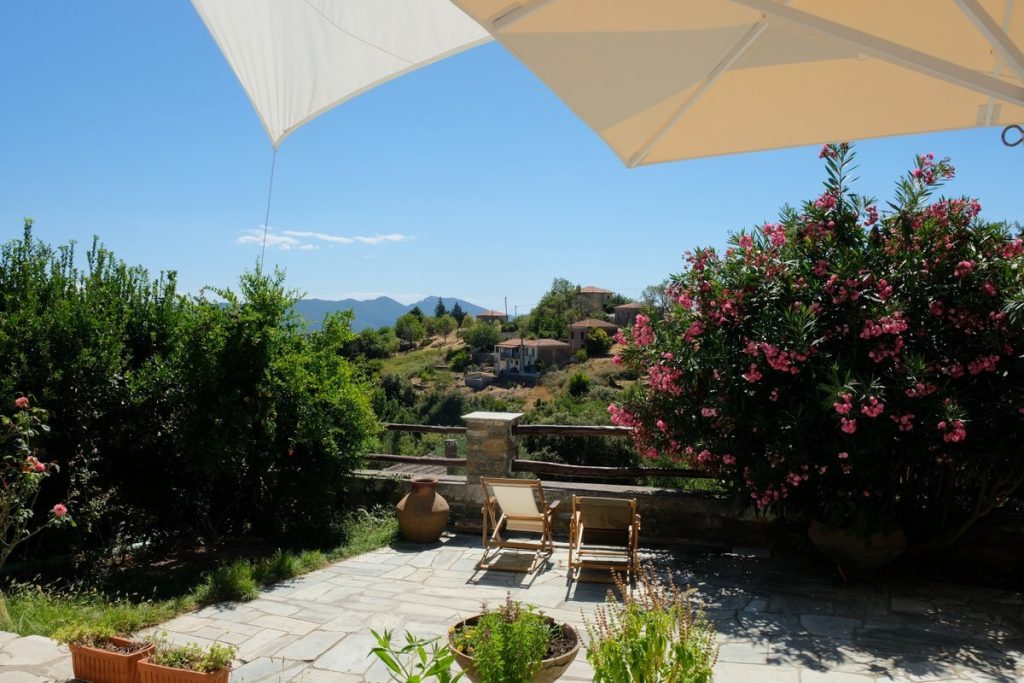 Amazing view from the terrace. Stay in a beautiful cottage overlooking the charming village of Lafkos and the fabulous nature of the South Pelion mountains.