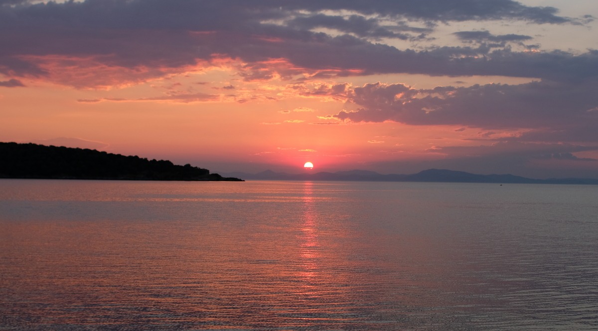 Enjoy one of the most tangerine dream sunsets in Greece at Milina, South Pelion.